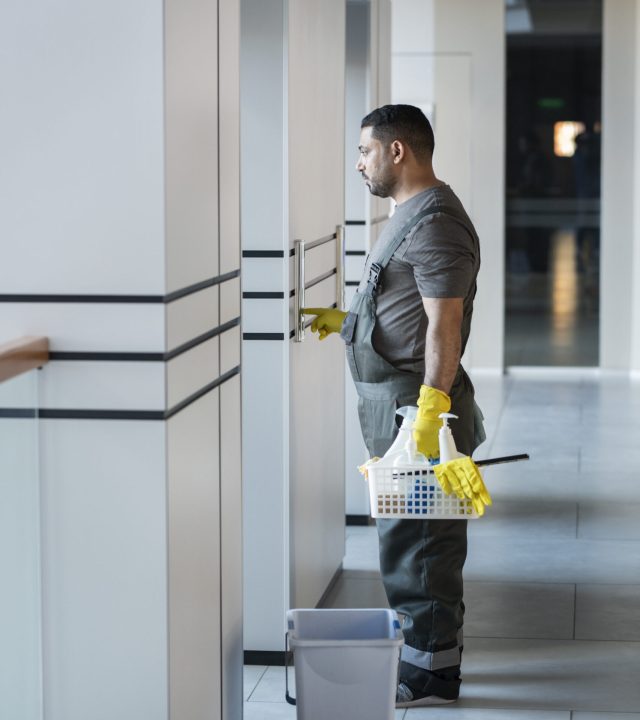 full-shot-man-with-cleaning-products full-shot-man-with-cleaning-products